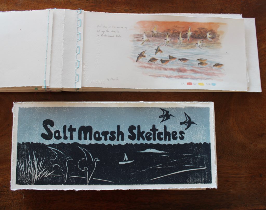 Woodcut prints make great covers for these stitched sketchbooks